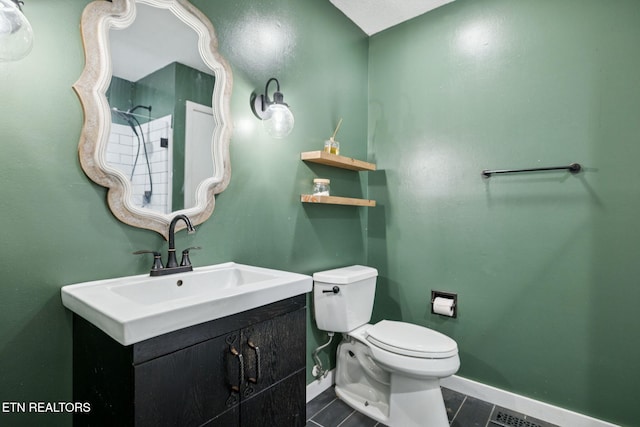 7901 Ewing Rd, Powell, TN 37849 - bathroom featuring toilet, tile patterned floors, vanity, and baseboards