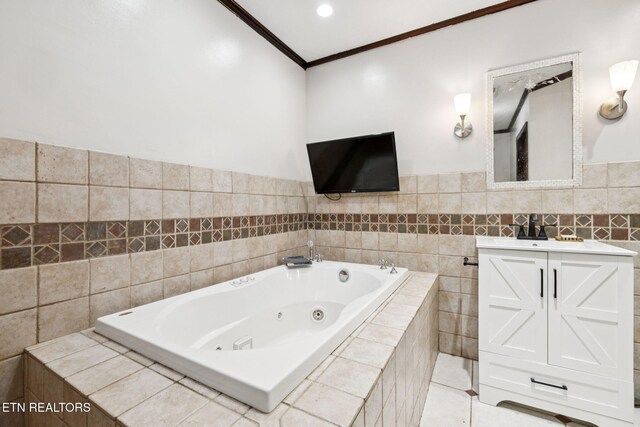 7901 Ewing Rd, Powell, TN 37849 - bathroom with a tub with jets, vanity, crown molding, and tile walls