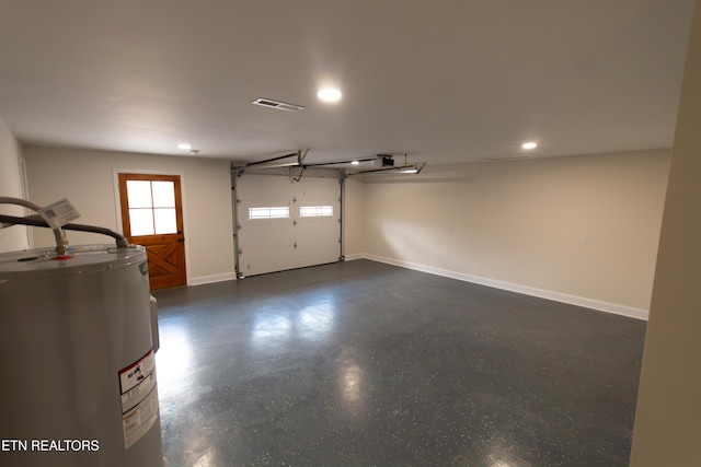 1497 Clevenger Rd, New Market, TN 37820 - garage with electric water heater, baseboards, and recessed lighting
