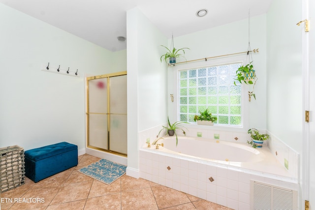 7924 Cedar Stone Ln, Powell, TN 37849 - bathroom with a bath, a shower stall, and tile patterned flooring