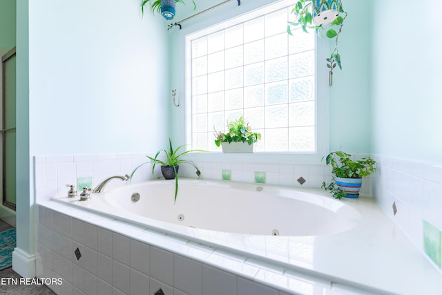 7924 Cedar Stone Ln, Powell, TN 37849 - full bath with a tub with jets and plenty of natural light