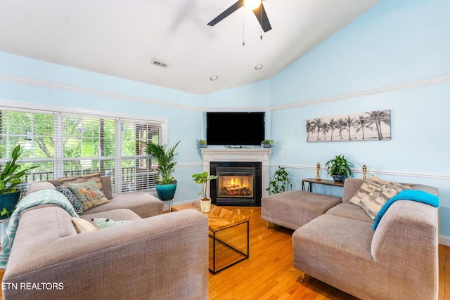 7924 Cedar Stone Ln, Powell, TN 37849 - living area featuring vaulted ceiling, light wood-type flooring, a ceiling fan, and a fireplace