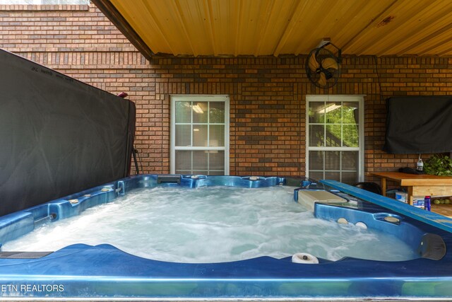 7924 Cedar Stone Ln, Powell, TN 37849 - view of patio / terrace featuring a hot tub