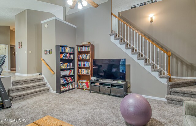 4512 Clairson Dr, Knoxville, TN 37931 - living room with stairway, carpet, ceiling fan, and baseboards