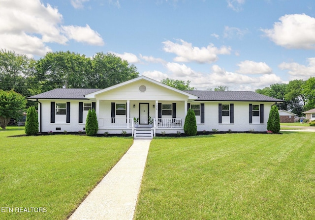7339 Brookside Dr, Chattanooga, TN 37421 - single story home with a porch, brick siding, roof with shingles, and a front lawn