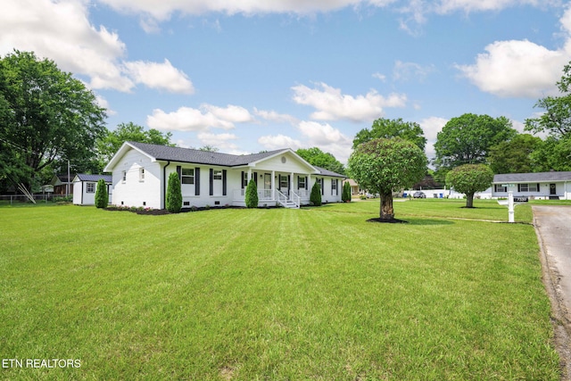 7339 Brookside Dr, Chattanooga, TN 37421 - view of front facade featuring covered porch, crawl space, and a front lawn