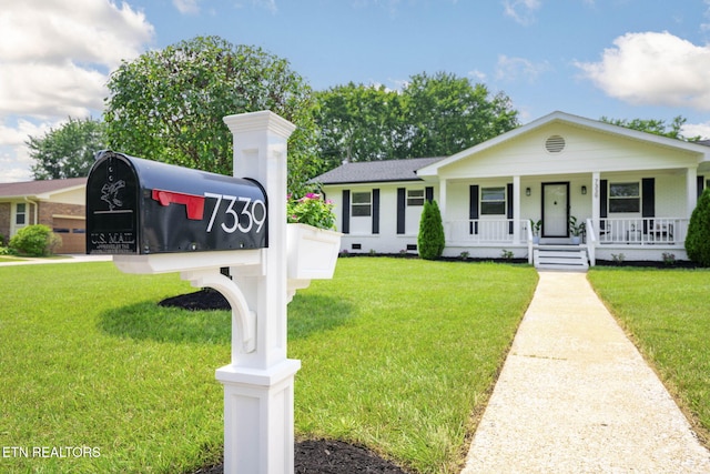 7339 Brookside Dr, Chattanooga, TN 37421 - view of front of house featuring covered porch and a front yard