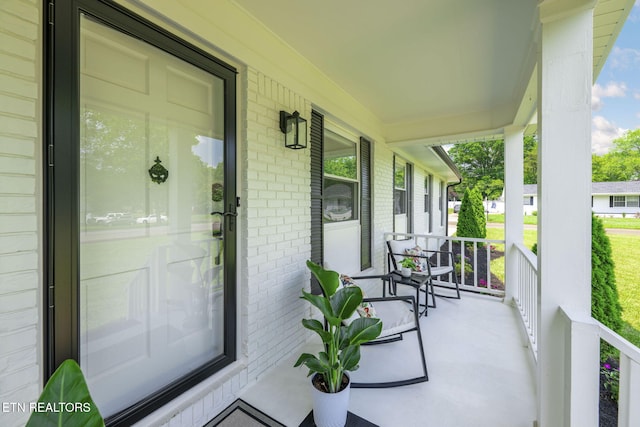 7339 Brookside Dr, Chattanooga, TN 37421 - entrance to property with covered porch and brick siding