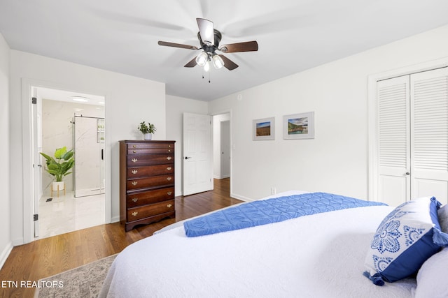 7339 Brookside Dr, Chattanooga, TN 37421 - bedroom featuring wood finished floors, a closet, baseboards, ensuite bathroom, and a ceiling fan