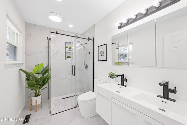 7339 Brookside Dr, Chattanooga, TN 37421 - bathroom featuring marble tiled flooring, a marble finish shower, toilet, double vanity, and recessed lighting
