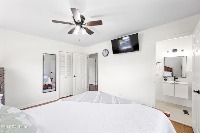 7339 Brookside Dr, Chattanooga, TN 37421 - bedroom with ensuite bath, a closet, a ceiling fan, and baseboards