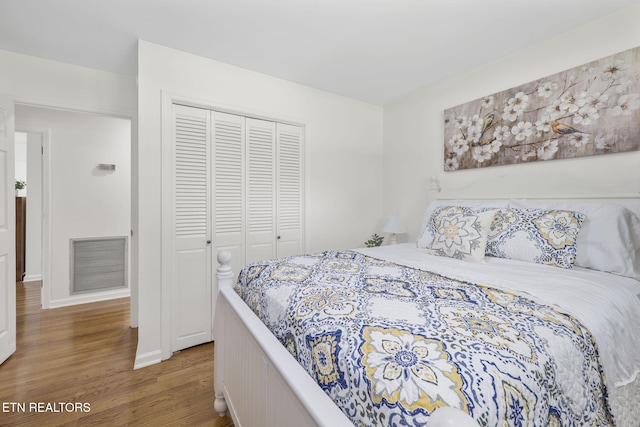 7339 Brookside Dr, Chattanooga, TN 37421 - bedroom featuring wood finished floors and a closet