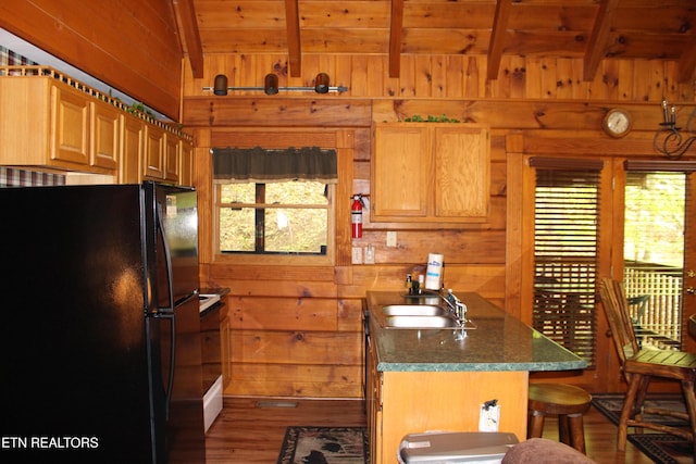 3006 Eagles Claw Way, Pigeon Forge, TN 37863 - kitchen featuring freestanding refrigerator, a sink, wood walls, wood finished floors, and wood ceiling