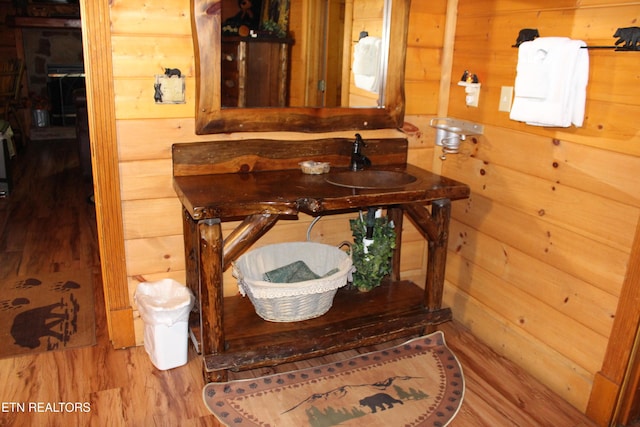 3006 Eagles Claw Way, Pigeon Forge, TN 37863 - bathroom with wood finished floors, wood walls, and vanity