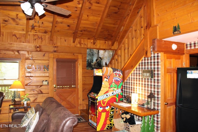 3006 Eagles Claw Way, Pigeon Forge, TN 37863 - living area featuring wooden walls, a ceiling fan, wood ceiling, and wood finished floors