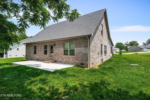 20 Cabot Ln, Cookeville, TN 38506 - back of property with a patio, brick siding, crawl space, and a lawn
