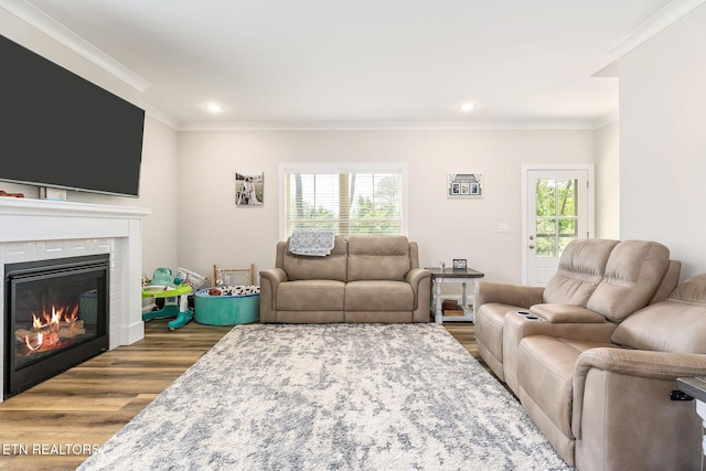 20 Cabot Ln, Cookeville, TN 38506 - living area with wood finished floors, plenty of natural light, ornamental molding, a tile fireplace, and recessed lighting