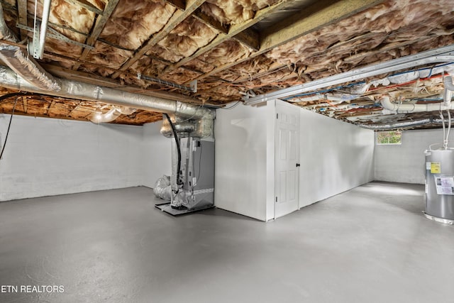 340 Gilbert St, Morristown, TN 37814 - basement with electric water heater and heating unit