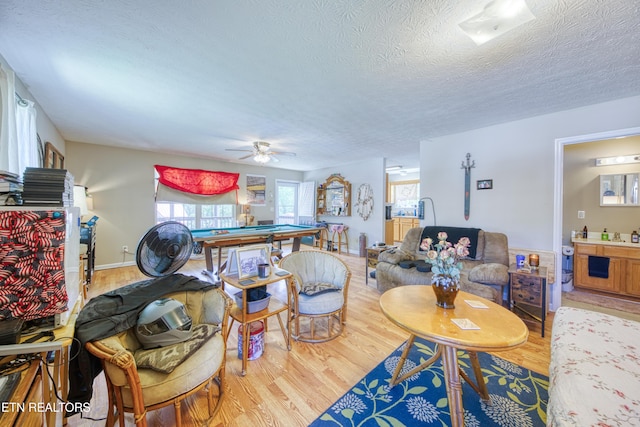 120 Rew St, Oakdale, TN 37829 - living area featuring wood finished floors, billiards table, a textured ceiling, and ceiling fan