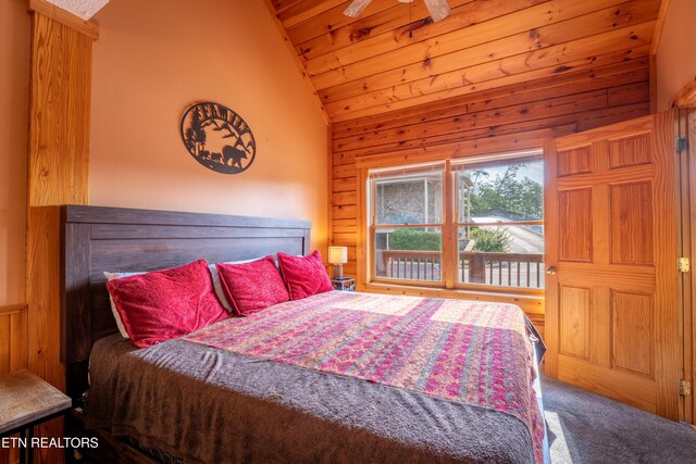 407 Big Bear Way, Pigeon Forge, TN 37863 - bedroom with vaulted ceiling, carpet flooring, wooden walls, and wooden ceiling