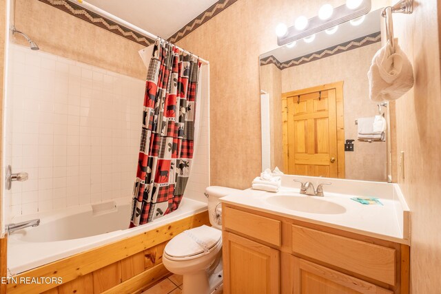 407 Big Bear Way, Pigeon Forge, TN 37863 - bathroom featuring toilet, vanity, shower / bath combo with shower curtain, and tile patterned floors