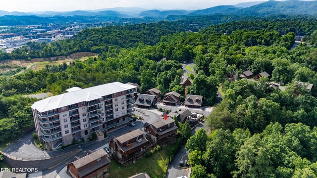 407 Big Bear Way, Pigeon Forge, TN 37863 - drone / aerial view of a heavily wooded area and a mountainous background