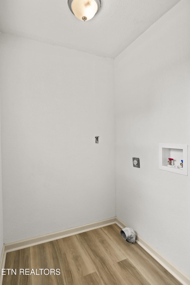 508 E Oldham Ave, Knoxville, TN 37917 - washroom featuring hookup for an electric dryer, washer hookup, wood finished floors, and baseboards