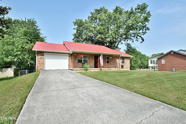 615 Mary St, Russellville, TN 37860 - ranch-style home featuring brick siding, driveway, an attached garage, covered porch, and metal roof