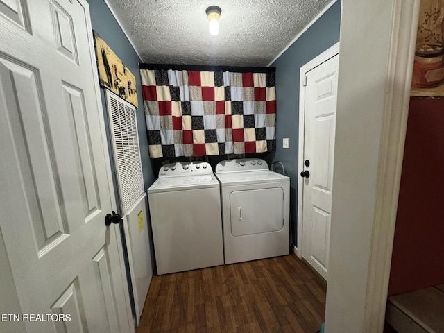108 Hawn Dr, Crab Orchard, TN 37723 - laundry area featuring separate washer and dryer, a textured ceiling, and dark wood finished floors