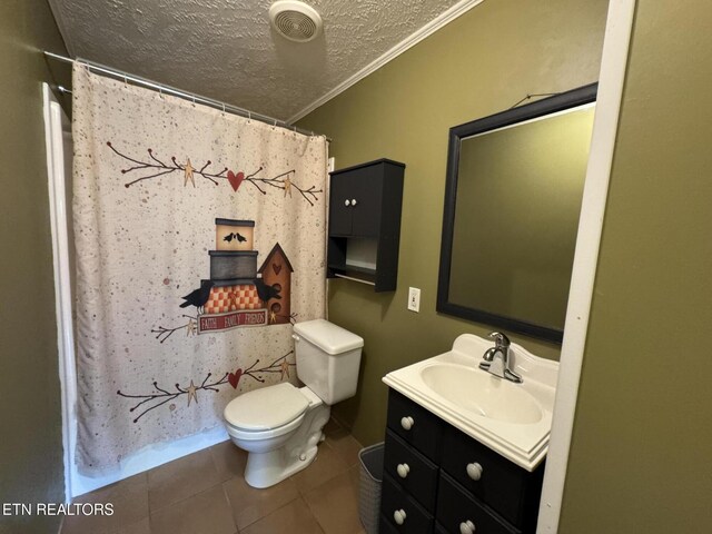 108 Hawn Dr, Crab Orchard, TN 37723 - bathroom featuring tile patterned flooring, toilet, a textured ceiling, vanity, and ornamental molding