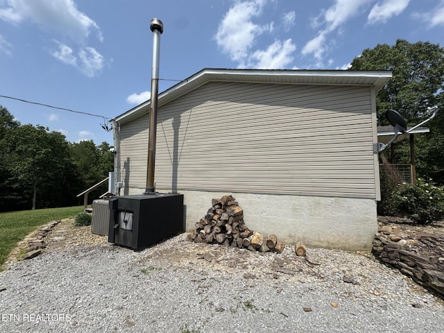 108 Hawn Dr, Crab Orchard, TN 37723 - view of side of home featuring central air condition unit