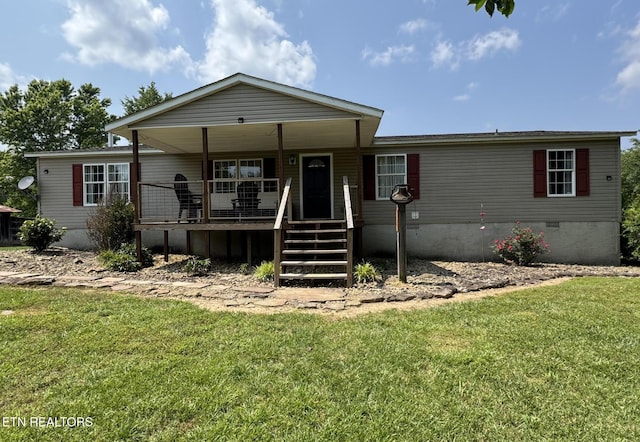 108 Hawn Dr, Crab Orchard, TN 37723 - view of front of house featuring covered porch, a front lawn, and crawl space
