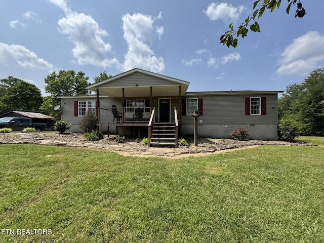 108 Hawn Dr, Crab Orchard, TN 37723 - view of front facade featuring a porch, a front yard, and crawl space