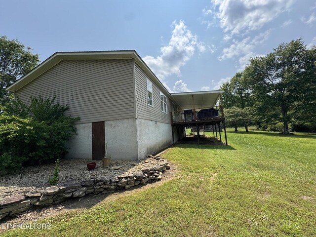 108 Hawn Dr, Crab Orchard, TN 37723 - view of side of property featuring a yard and a wooden deck