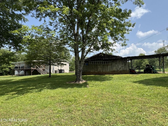 108 Hawn Dr, Crab Orchard, TN 37723 - view of grassy yard featuring stairway