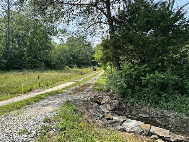 108 Hawn Dr, Crab Orchard, TN 37723 - view of road featuring a forest view