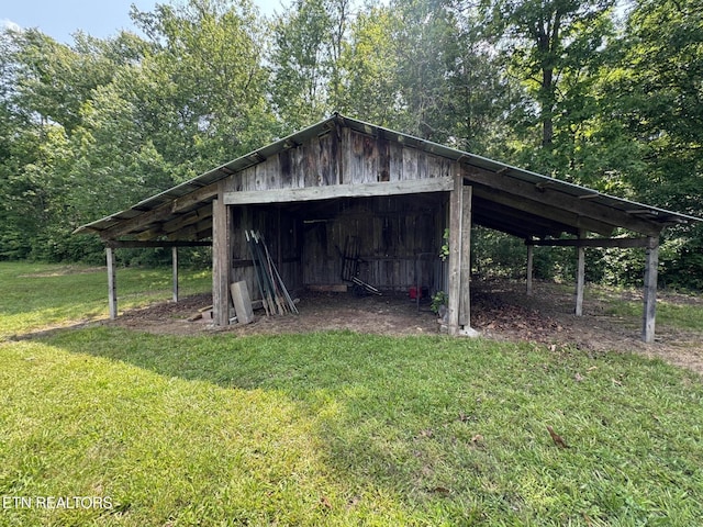 108 Hawn Dr, Crab Orchard, TN 37723 - view of pole building featuring a lawn