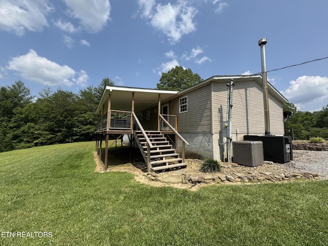 108 Hawn Dr, Crab Orchard, TN 37723 - back of house featuring stairs, a yard, cooling unit, and a deck