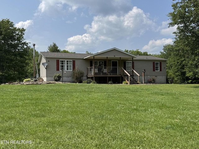 108 Hawn Dr, Crab Orchard, TN 37723 - view of front of house featuring a porch and a front yard