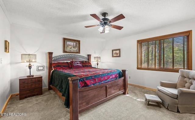 725 Sunshine Trl, Gatlinburg, TN 37738 - bedroom with carpet floors, baseboards, a textured ceiling, and a ceiling fan