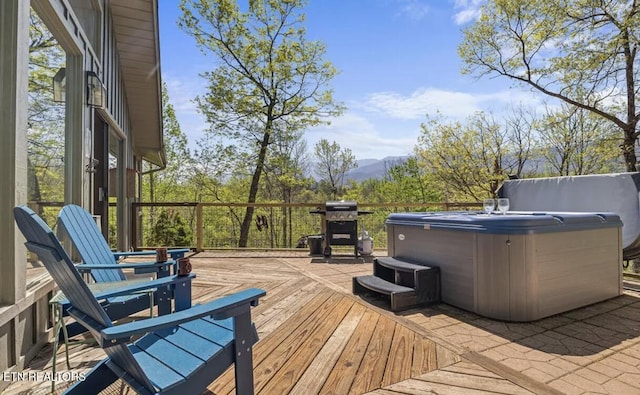 725 Sunshine Trl, Gatlinburg, TN 37738 - deck featuring a hot tub and a mountain view