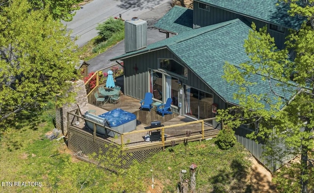 725 Sunshine Trl, Gatlinburg, TN 37738 - back of property with a shingled roof, a wooden deck, board and batten siding, a chimney, and central air condition unit