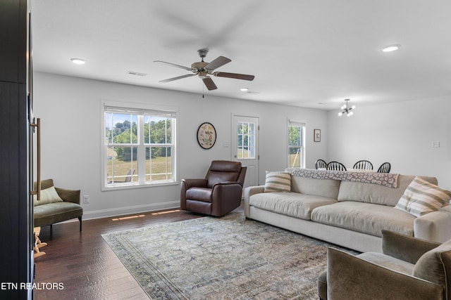 137 Storm Ln, Jacksboro, TN 37757 - living area with dark wood-style flooring, recessed lighting, baseboards, a ceiling fan, and a chandelier