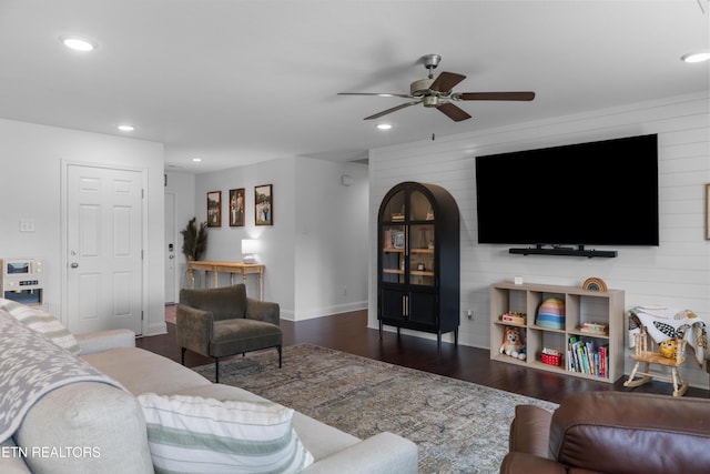 137 Storm Ln, Jacksboro, TN 37757 - living room with a ceiling fan, dark wood-style floors, recessed lighting, baseboards, and wood walls