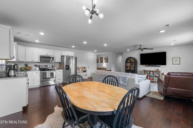 137 Storm Ln, Jacksboro, TN 37757 - dining space with recessed lighting, ceiling fan, dark wood-type flooring, and a chandelier