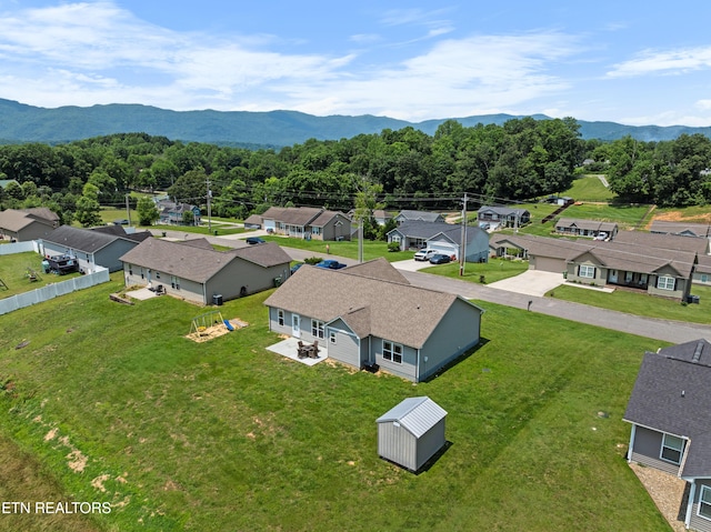 137 Storm Ln, Jacksboro, TN 37757 - aerial view of residential area featuring a mountainous background