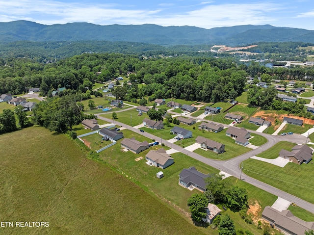 137 Storm Ln, Jacksboro, TN 37757 - aerial view of property's location featuring a mountain backdrop and nearby suburban area