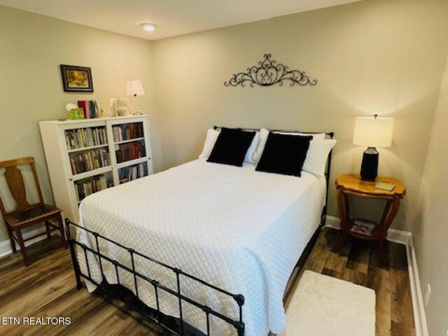 834 Hinkle Estates Dr, Seymour, TN 37865 - bedroom with baseboards and wood finished floors