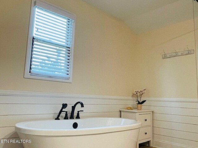 834 Hinkle Estates Dr, Seymour, TN 37865 - full bathroom with a soaking tub and wainscoting