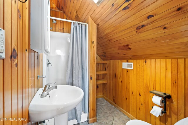 2295 Bluff Mountain Rd, Sevierville, TN 37876 - full bathroom featuring a shower with curtain, tile patterned floors, wooden walls, a sink, and wooden ceiling
